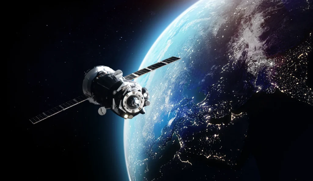 Satellite orbiting Earth, highlighting advanced telemetry data systems in aerospace technology.